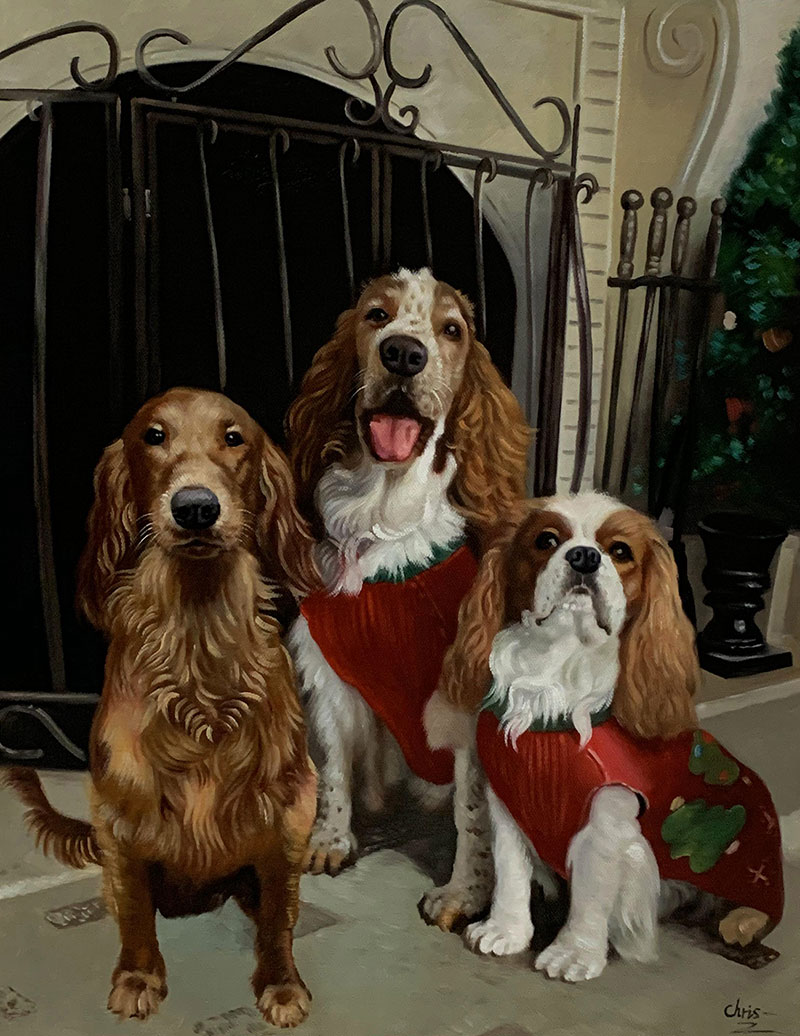 Three dogs in Christmas sweaters by a fireplace