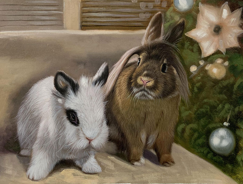 Painting of two rabbits near a Christmas tree.