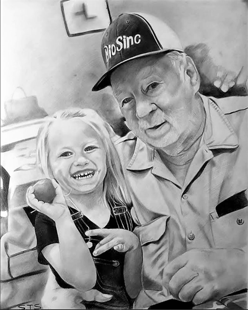 picture to charcoal drawing of father and child