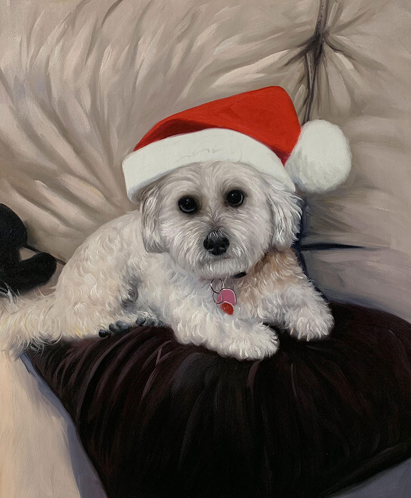 Painting of a small white dog wearing a Santa hat on a dark cushion