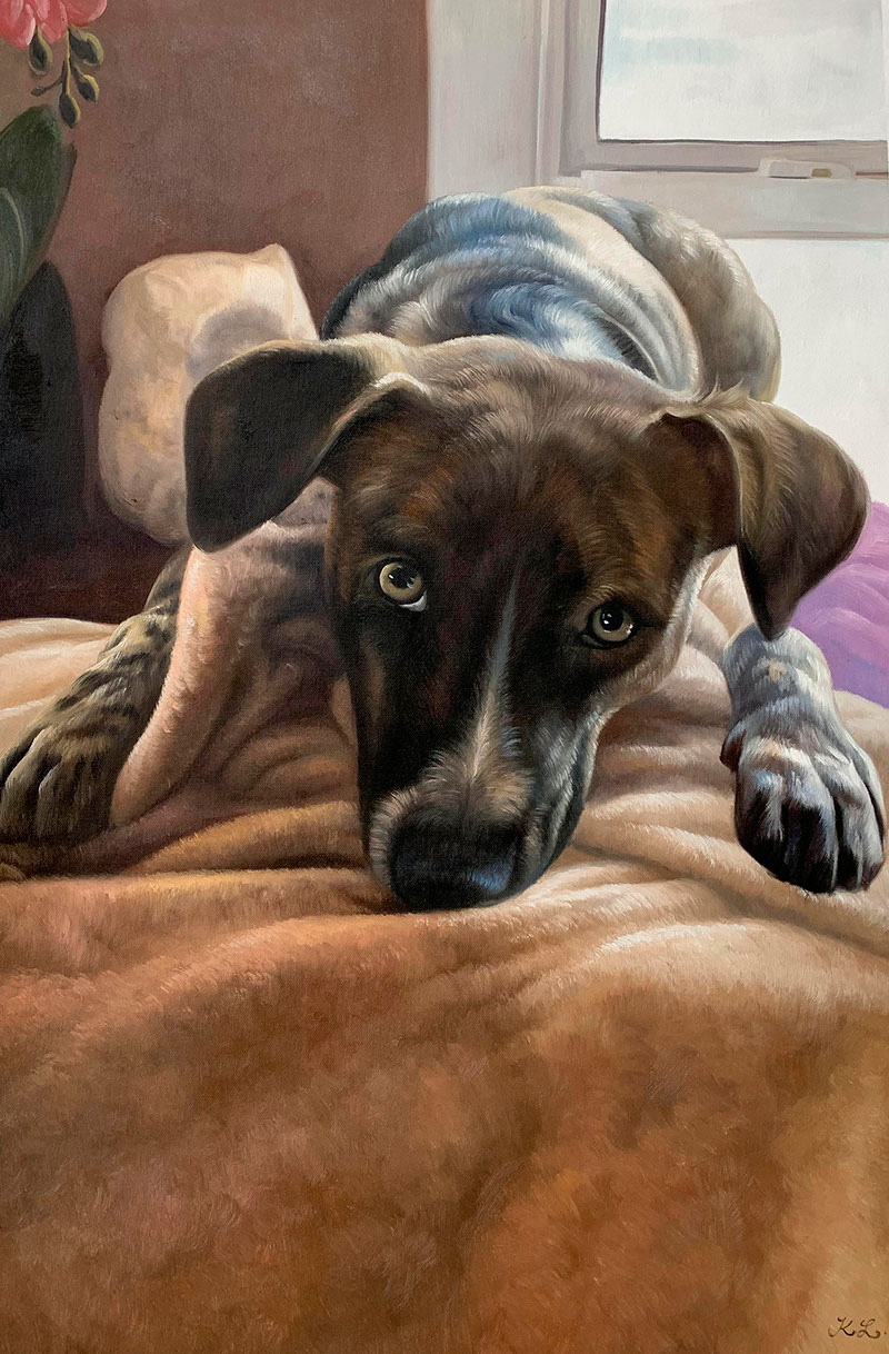 Painting of a dark-colored puppy lying on a tan blanket, looking at the viewer.
