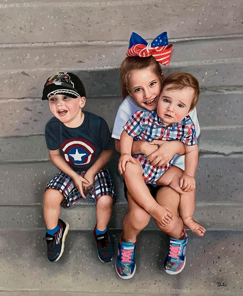 Portrait of three young children sitting on steps, one girl is holding a baby, and a boy is sitting beside them.