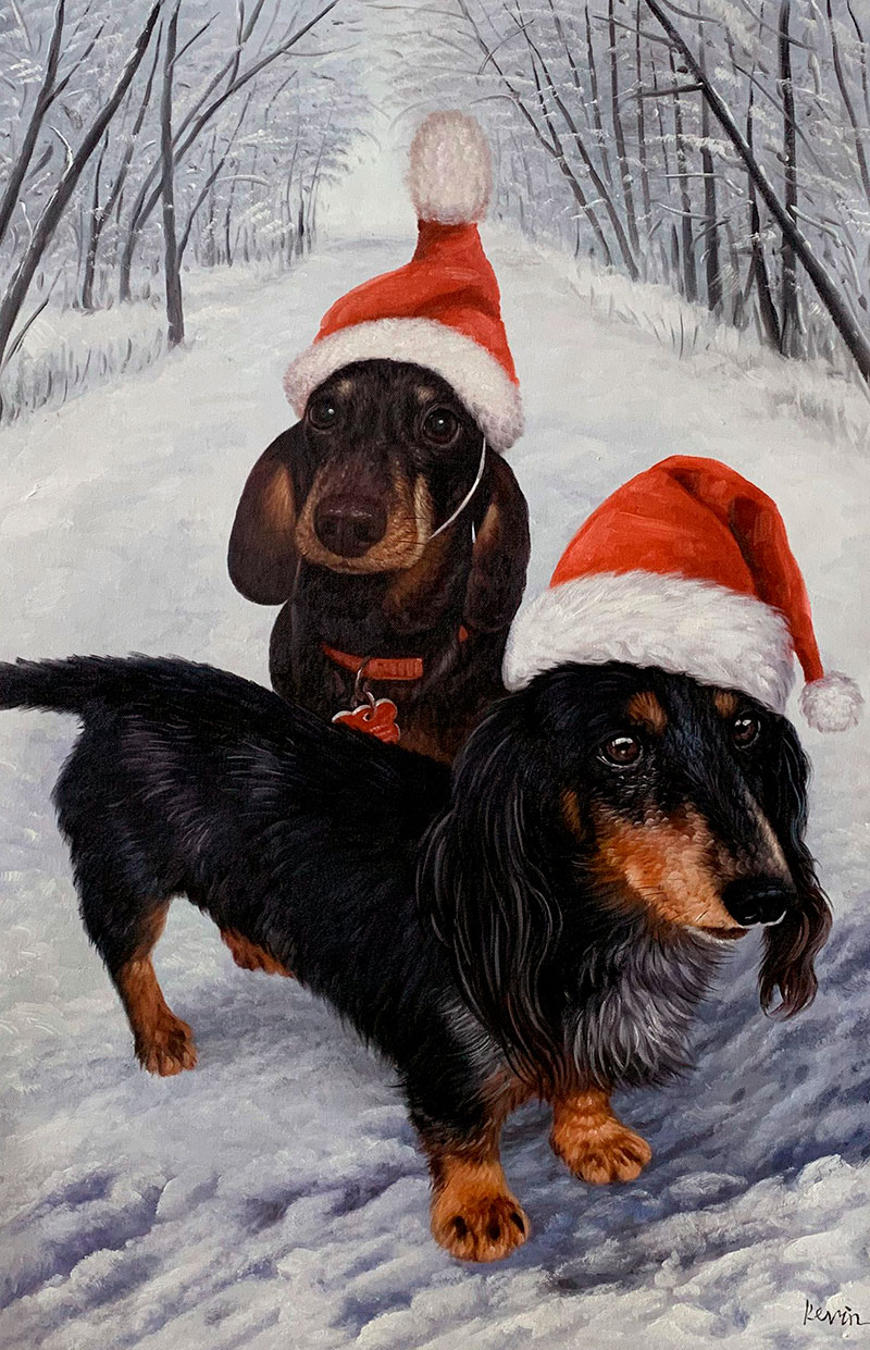 Two dachshunds wearing Santa hats in a snowy winter scene.