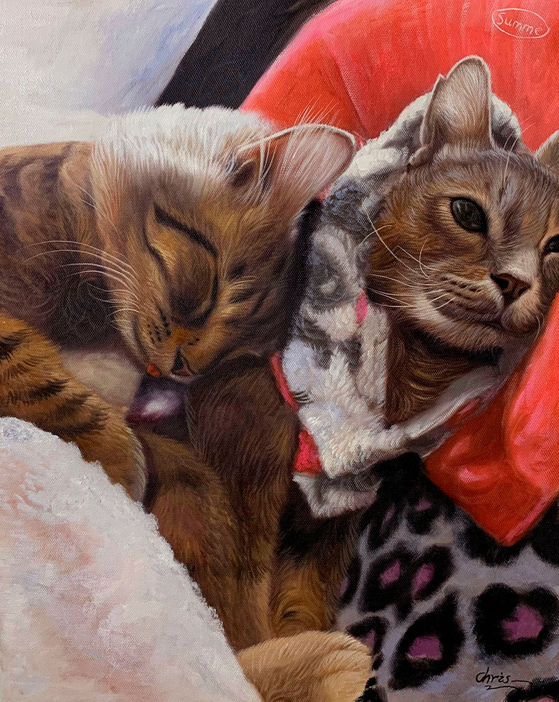 Painting of two cats cuddling under a blanket.