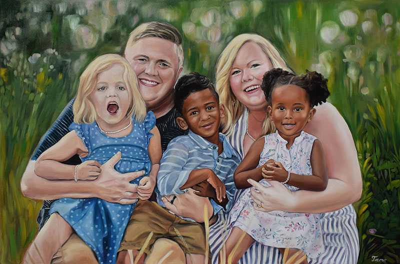 custom oil painting of a family outside in the flower fields