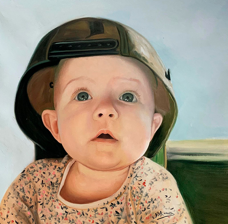 Gorgeous oil artwork of a baby with a cap