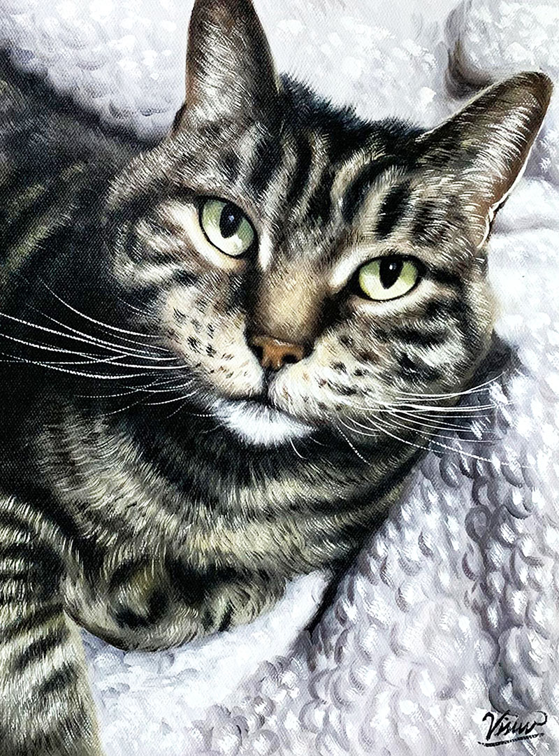 Painting of a tabby cat resting on a light gray blanket.