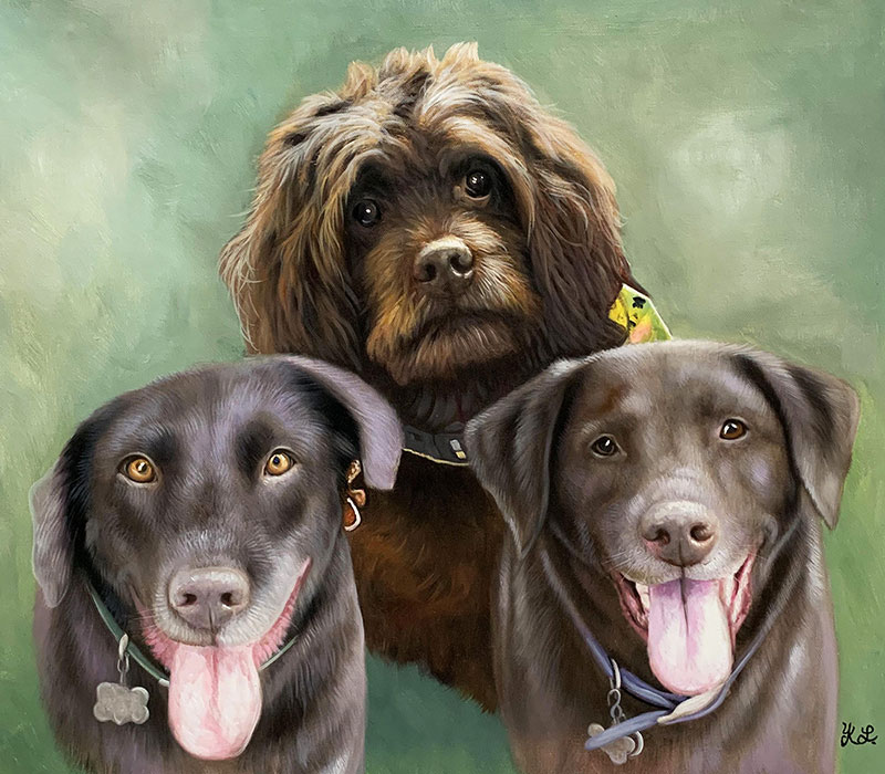 Painting of three dogs, a brown Cockapoo and two black Labradors.