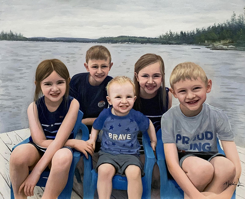 Five siblings smiling on a dock by a lake.