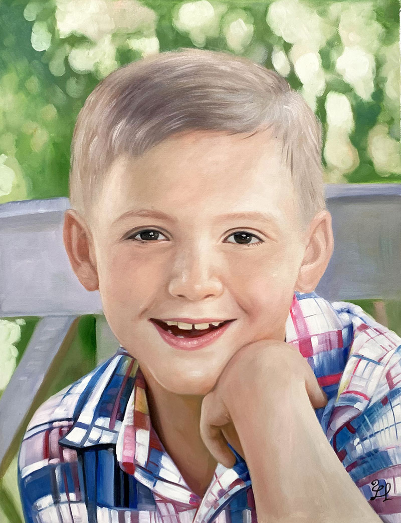 Portrait of a smiling young boy in a plaid shirt