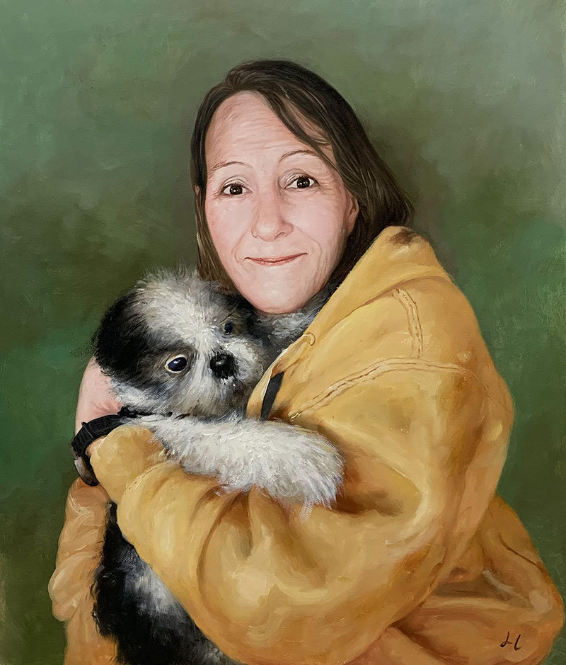 Beautiful oil painting of a woman holding a dog