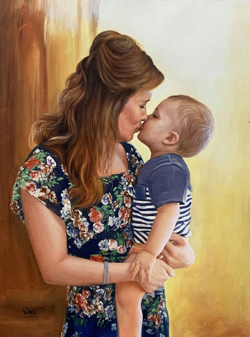 Gorgeous handmade oil artwork of a mother kissing a baby