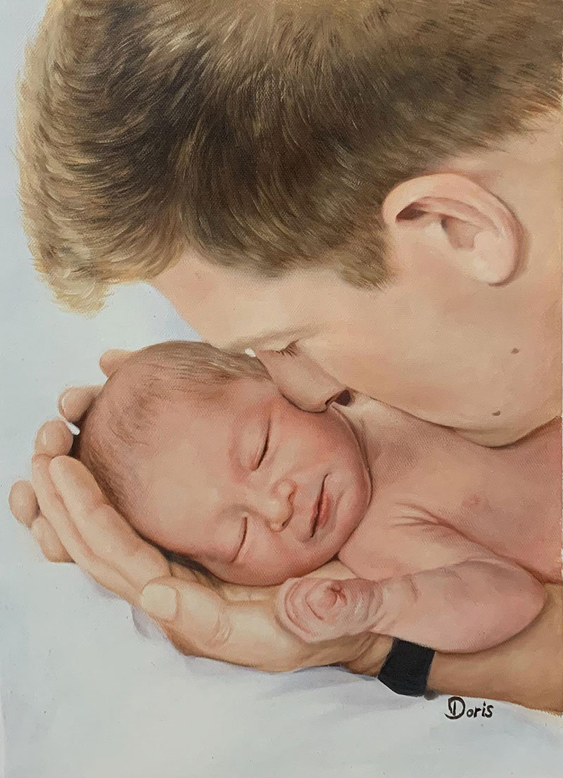 Gorgeous handmade oil artwork of a father holding a baby