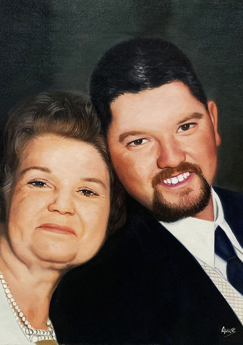 Painted portrait of a woman and a man.