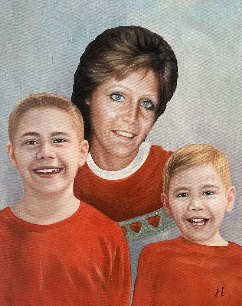 Oil painting of a mother and her two young sons in red shirts.