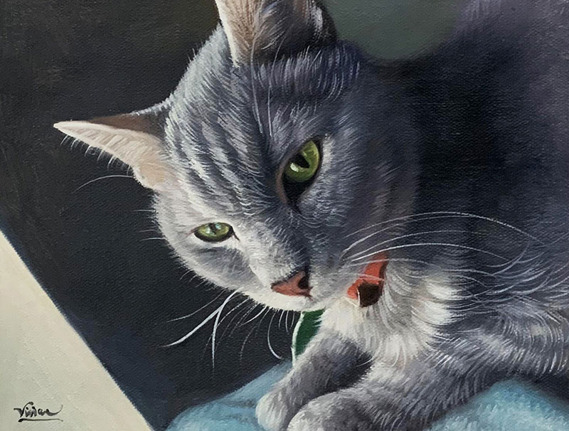 Beautiful acrylic painting of a cat with green eyes