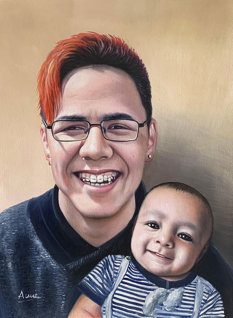 Oil painting of a smiling young man with orange hair and glasses holding a baby.