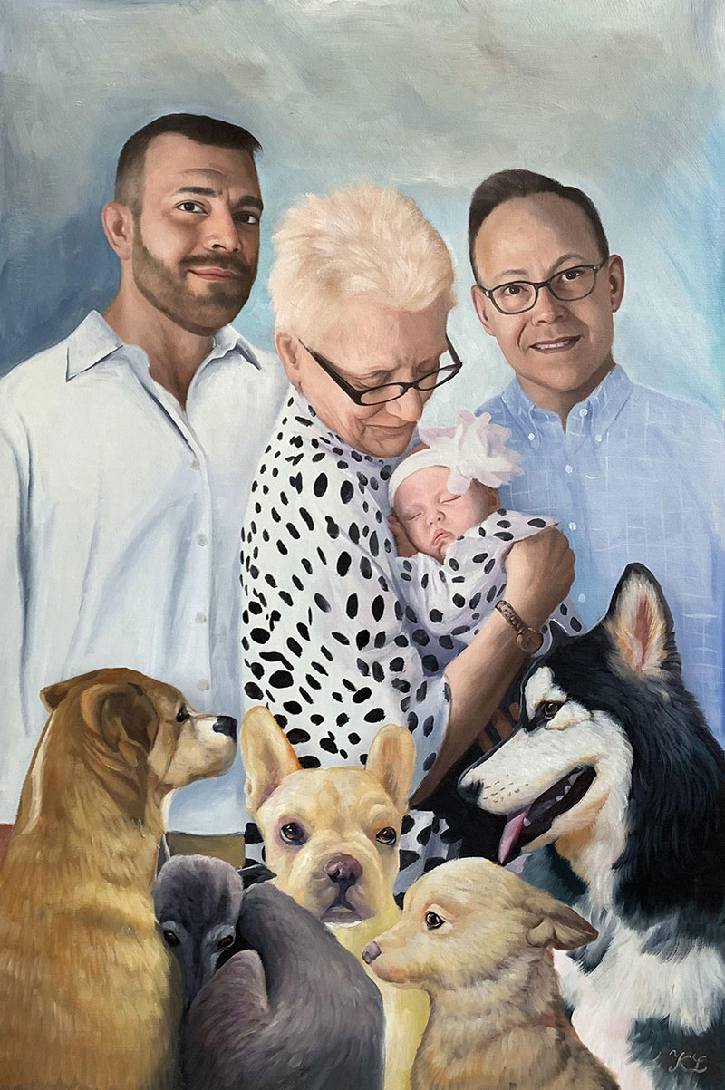 Beautiful family portrait with five dogs