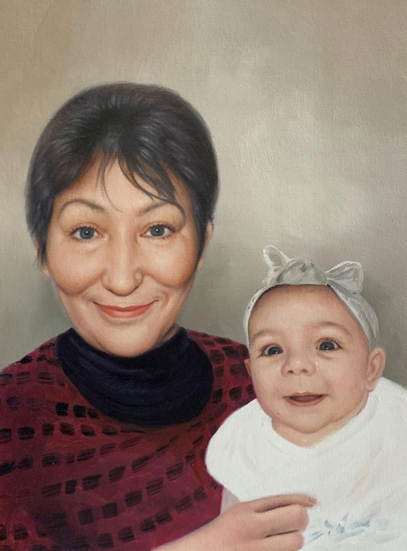 Oil painting portrait of a woman holding a baby.
