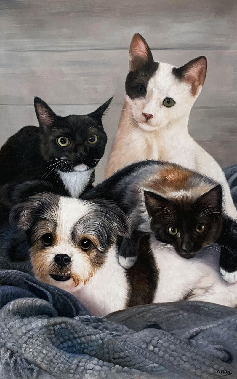 Painting of a dog and three cats nestled together on a blue blanket.