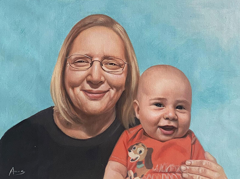 Oil painting of a woman and baby.