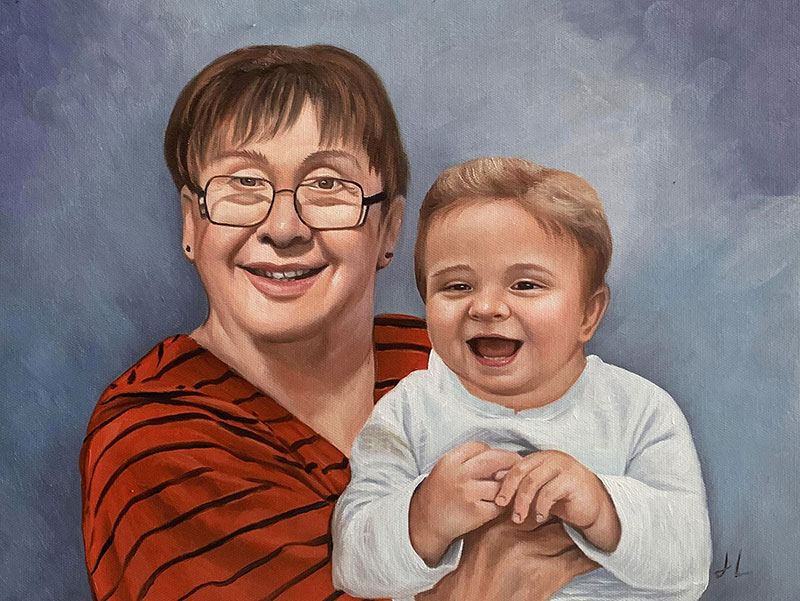 Beautiful oil artwork of a grandmother holding a granchild
