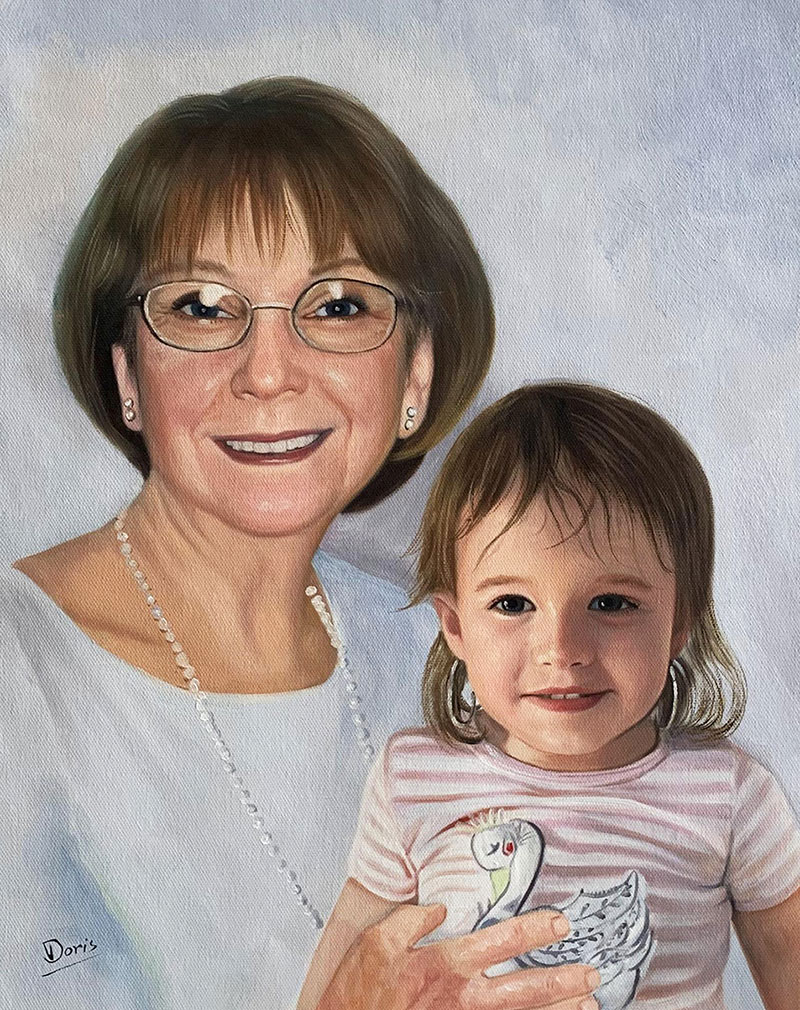 Oil painting portrait of a grandmother and granddaughter.