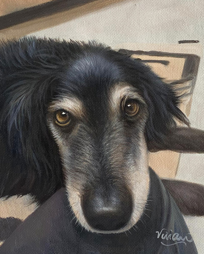 Close-up painting of a black dog`s face.