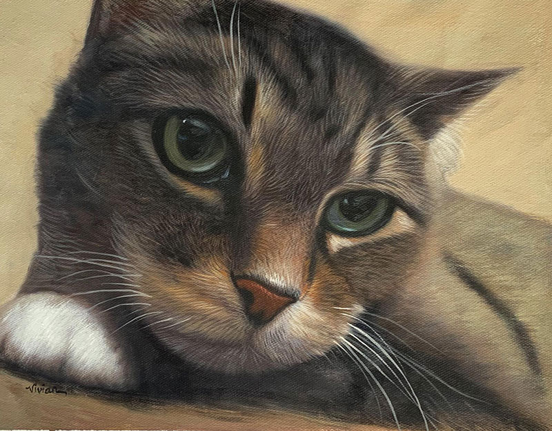 Close-up painting of a tabby cat with green eyes.