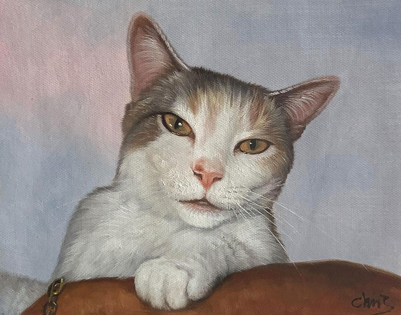 Painting of a calico cat resting on a brown surface