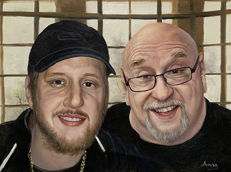 Painting of two men, one wearing a baseball cap and the other wearing glasses.