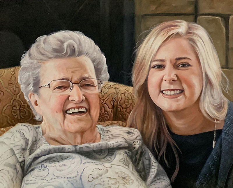 Painted portrait of an older woman with glasses laughing and a younger blonde woman smiling.