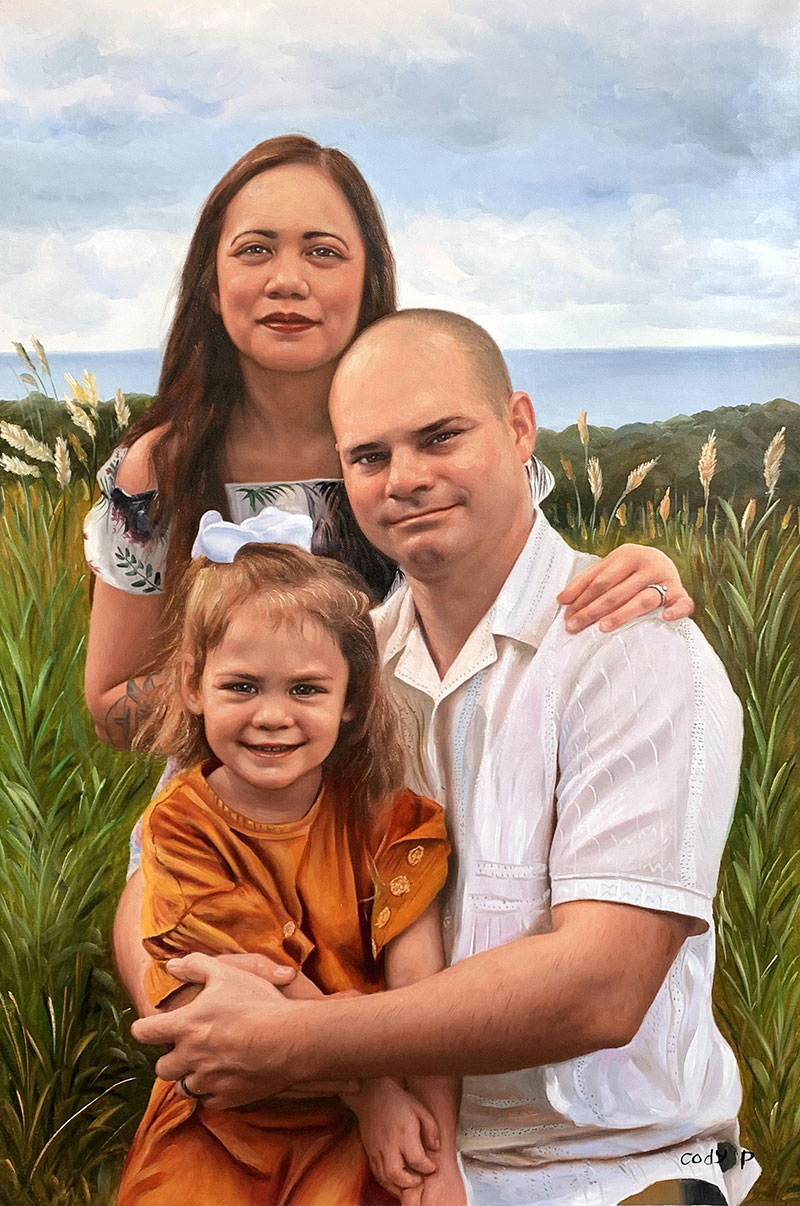 Family portrait: mother, father, and young daughter sitting together outdoors.