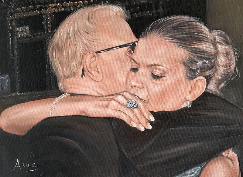 Painting of a father and daughter embracing.