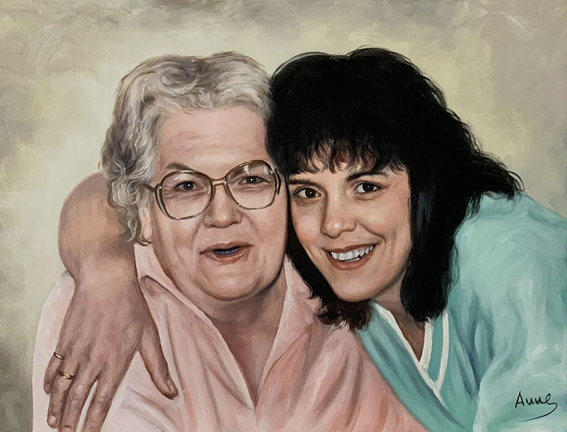 Painted portrait of two women embracing, one older woman with glasses and one younger woman with dark hair.