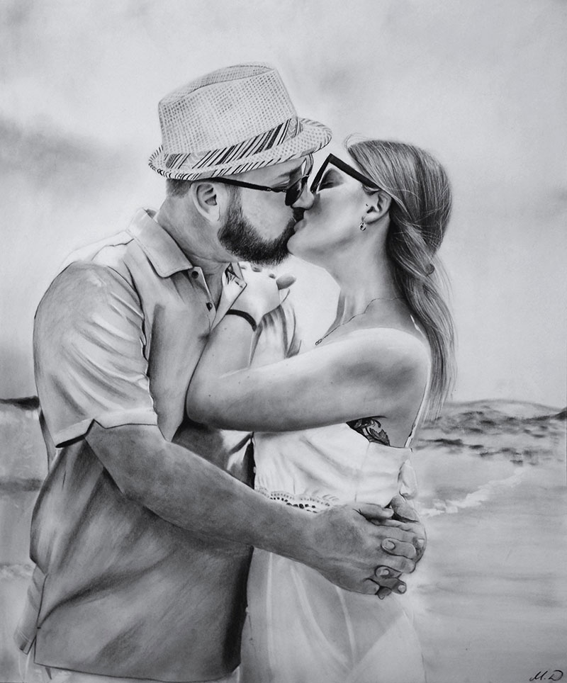 Beautiful charcoal drawing of a couple kissing