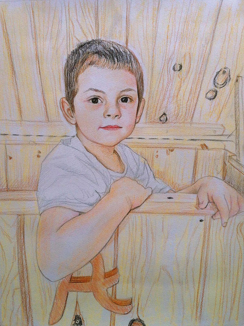 custom colored pencil of a boy sitting in a wooden box
