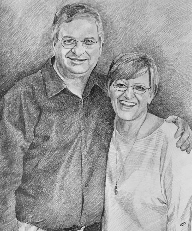 Custom black pencil drawing of a couple