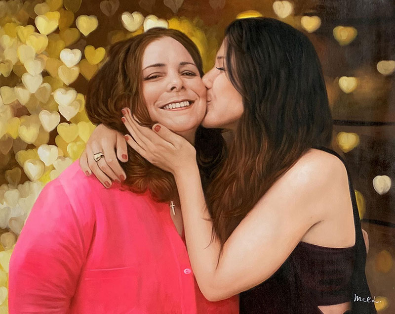 Painting of two women embracing, one kissing the other`s cheek, hearts in the background.