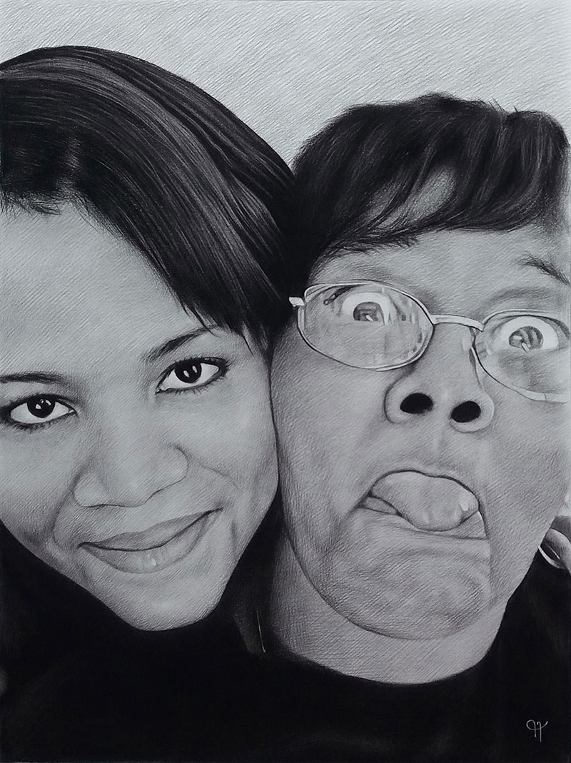 Beautiful close up charcoal drawing of a mother and daughter