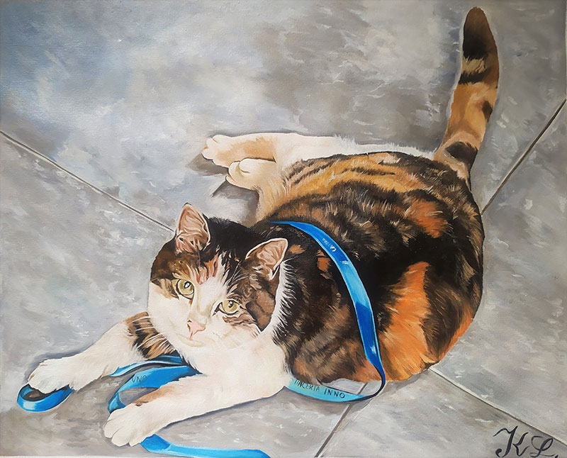 Painting of calico cat lying on a tiled floor with a blue ribbon around its neck.