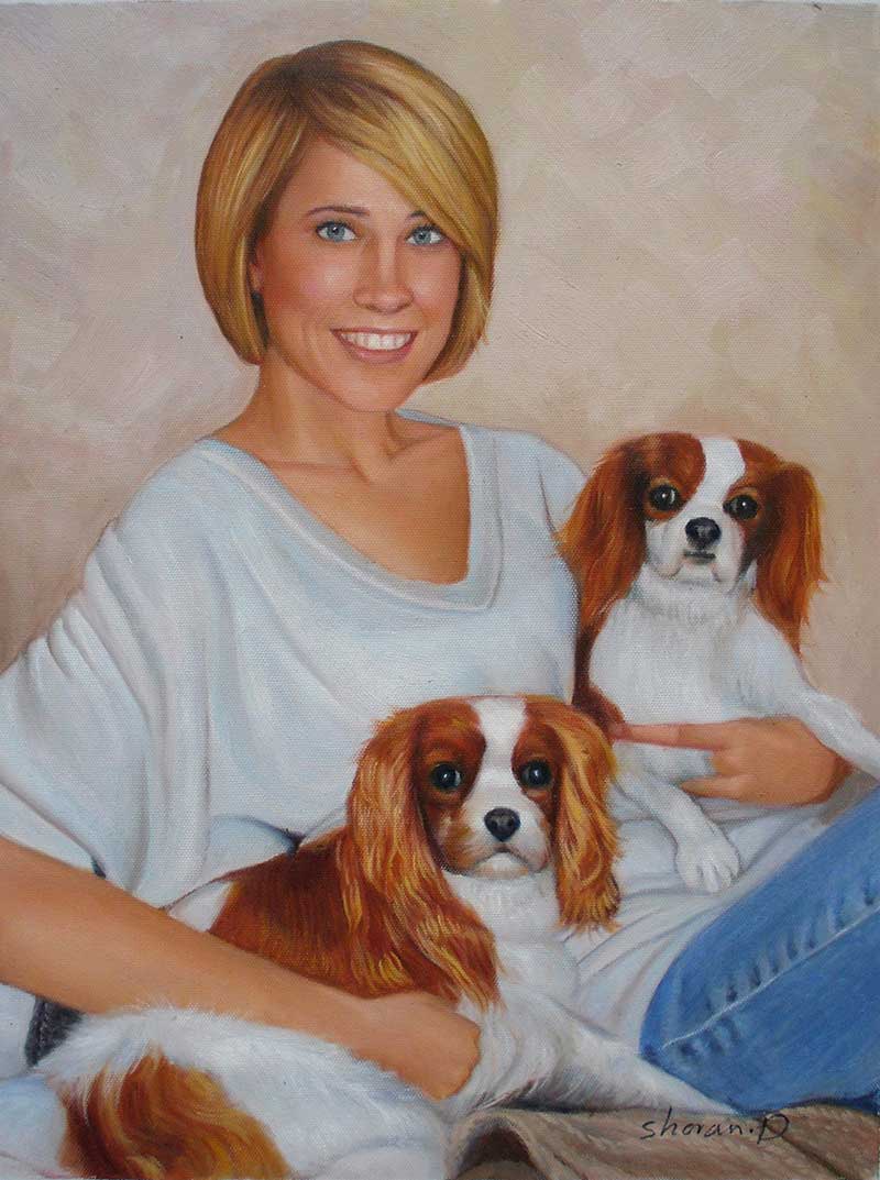 Custom oil painting of ownder holding two brown dogs