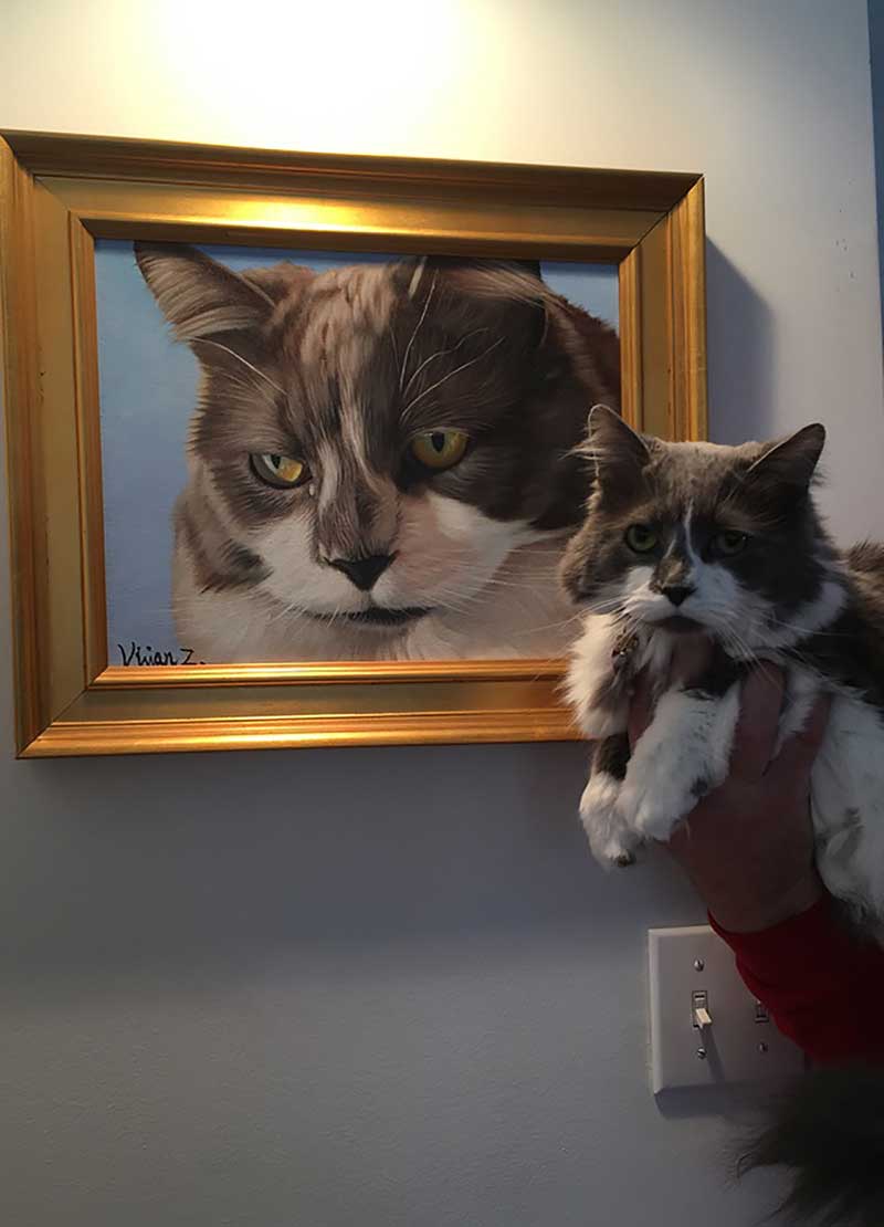 an oil painting of a cat with beautiful dark yellow eyes