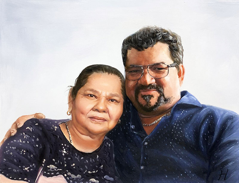 Oil painting portrait of a man and woman embracing.