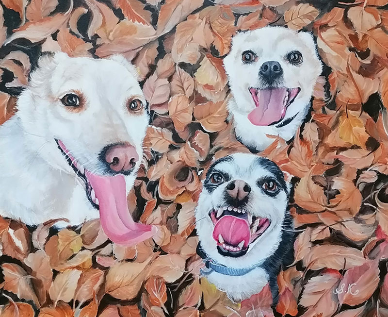 Painting of three dogs in autumn leaves
