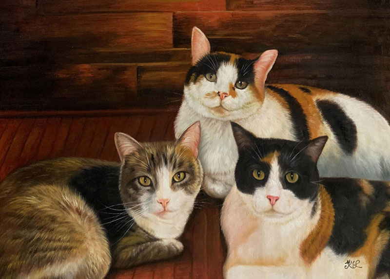Painting of three calico cats sitting on a wooden floor.