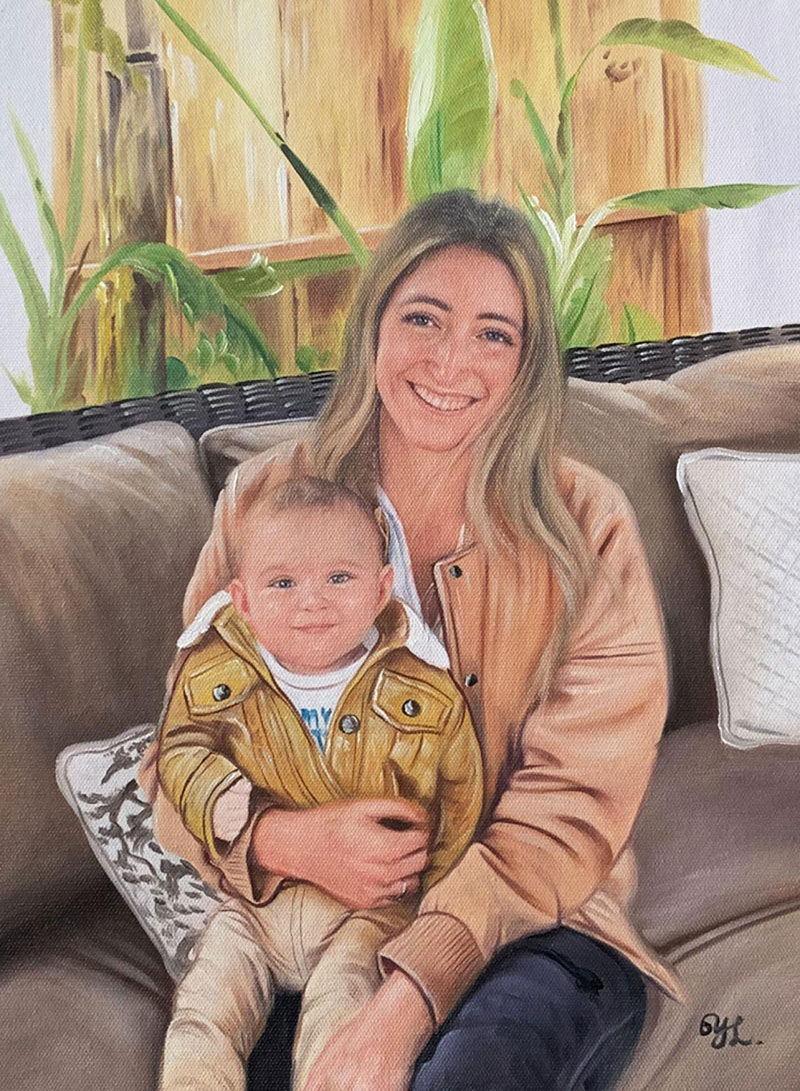 Painting of a mother and her baby son sitting on a couch outdoors