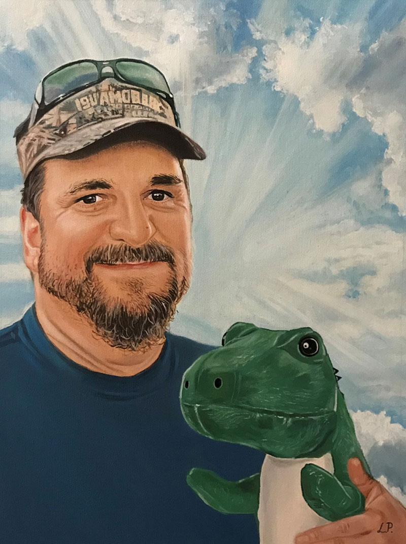Painting of a man with a goatee wearing a camouflage hat and holding a green dinosaur puppet against a cloudy sky background.
