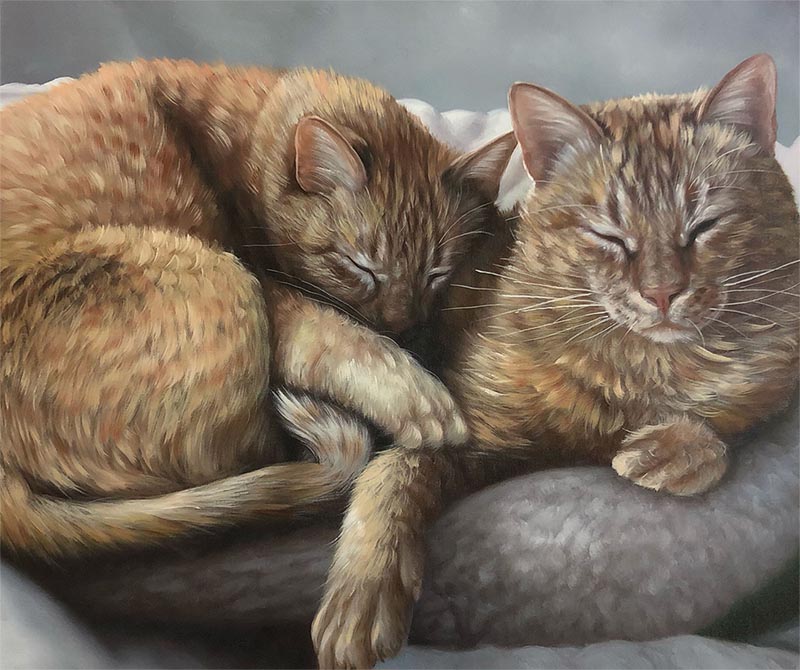 Painting of two orange tabby cats sleeping together on a cushion.