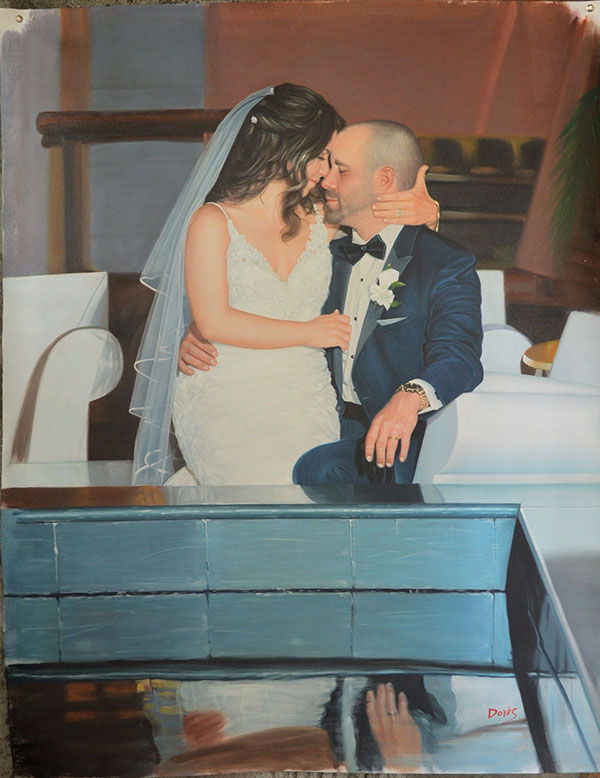 a custom oil painting of a bride embracing her husband